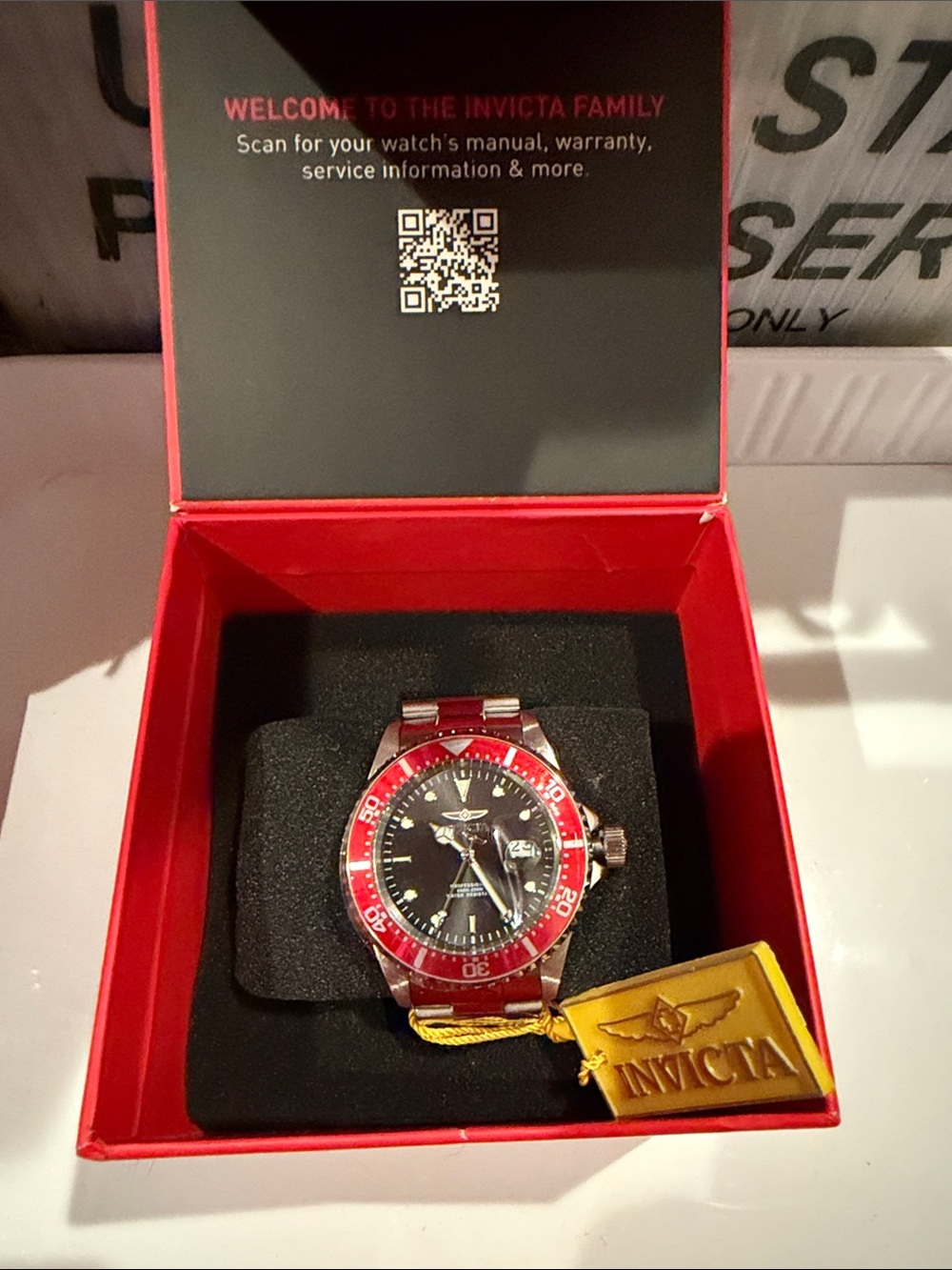 Invicta Men’s Red and Black Stainless Steel Dive-Style Watch
